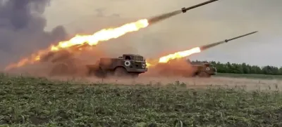 In this handout photo released by Russian Defense Ministry Press Service released on Wednesday, June 1, 2022, The Russian military's Uragan multiple rocket launchers fire rockets at Ukrainian troops at an undisclosed location. (Russian Defense Ministry Press Service via AP)