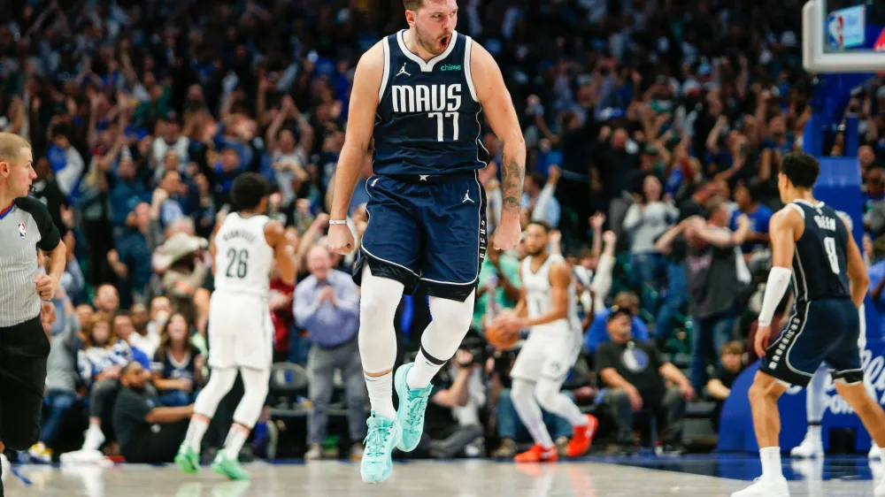 Oct 27, 2023; Dallas, Texas, USA; Dallas Mavericks guard Luka Doncic (77) reacts after hitting a go ahead 3-pointer late in the fourth quarter against the Brooklyn Nets at American Airlines Center. Mandatory Credit: Andrew Dieb-USA TODAY Sports
