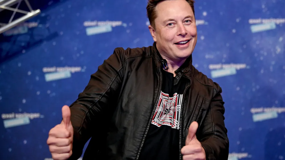 FILED - 01 December 2020, Berlin: Elon Musk, head of the space company SpaceX and Tesla CEO, arrives at the Axel Springer Award ceremony. Photo: Britta Pedersen/dpa/Pool/dpa