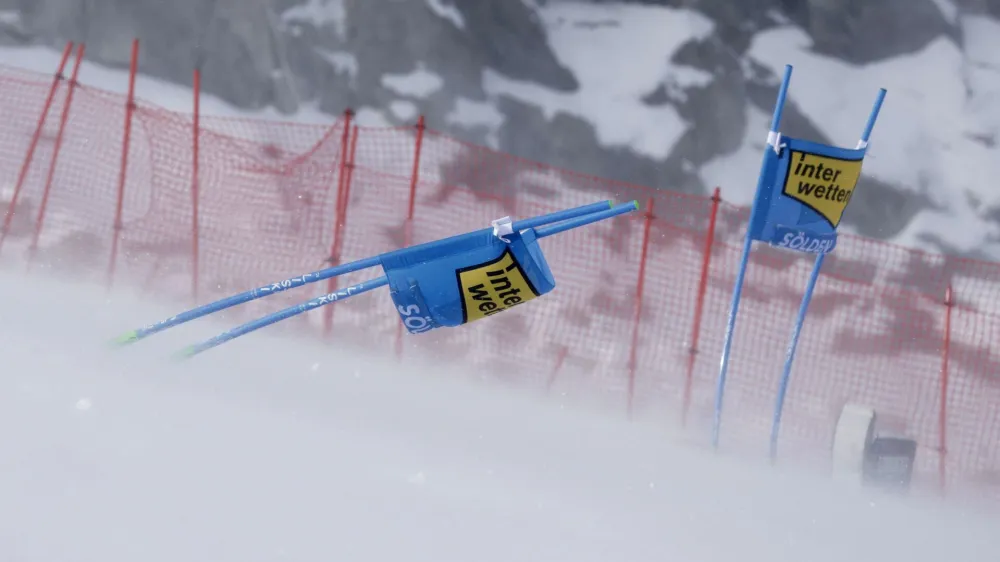 Alpine Skiing - FIS Alpine Ski World Cup - Men's Giant Slalom - Soelden, Austria - October 29, 2023 A ski gate is pictured as it gets hit by strong winds during the first run REUTERS/Leonhard Foeger