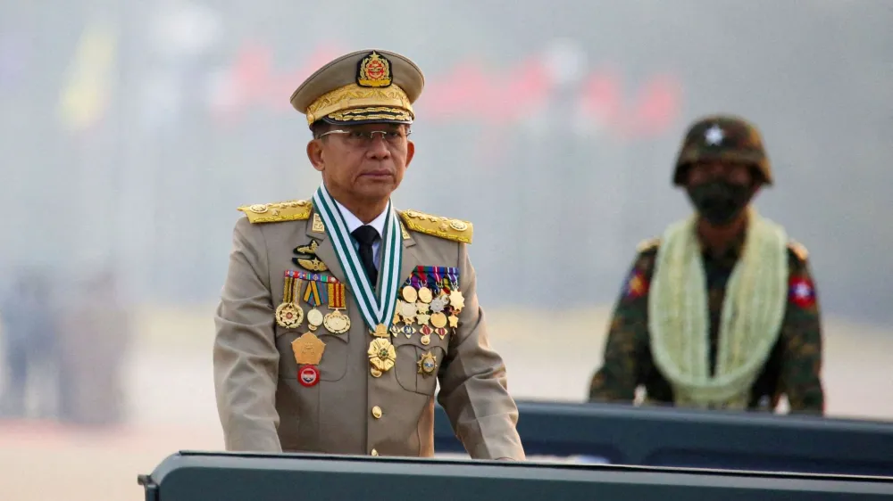 FILE PHOTO: FILE PHOTO: Myanmar's junta leader General Min Aung Hlaing, who ousted the elected government in a coup on February 1, 2021, presides over an army parade on Armed Forces Day in Naypyitaw, Myanmar, March 27, 2021. REUTERS/Stringer/File Photo/File Photo