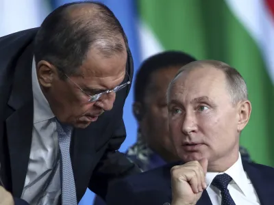 ﻿FILE - Russian President Vladimir Putin, right, listens to Russian Foreign Minister Sergey Lavrov, top, as Egyptian President Abdel Fattah el-Sisi sits next during a plenary session at the Russia-Africa summit in the Black Sea resort of Sochi, Russia, Oct. 24, 2019. In his role for nearly 18 years, Lavrov, 71, has seen relations with the West shift from near-friendly to openly hostile, plummeting to a catastrophic new low with the Russian war against Ukraine. The invasion prompted the European Union to freeze the assets of both Putin and Lavrov, among others â€" an unprecedented blow to Moscow's pride. (Valery Sharifulin, TASS News Agency Pool Photo via AP, File)