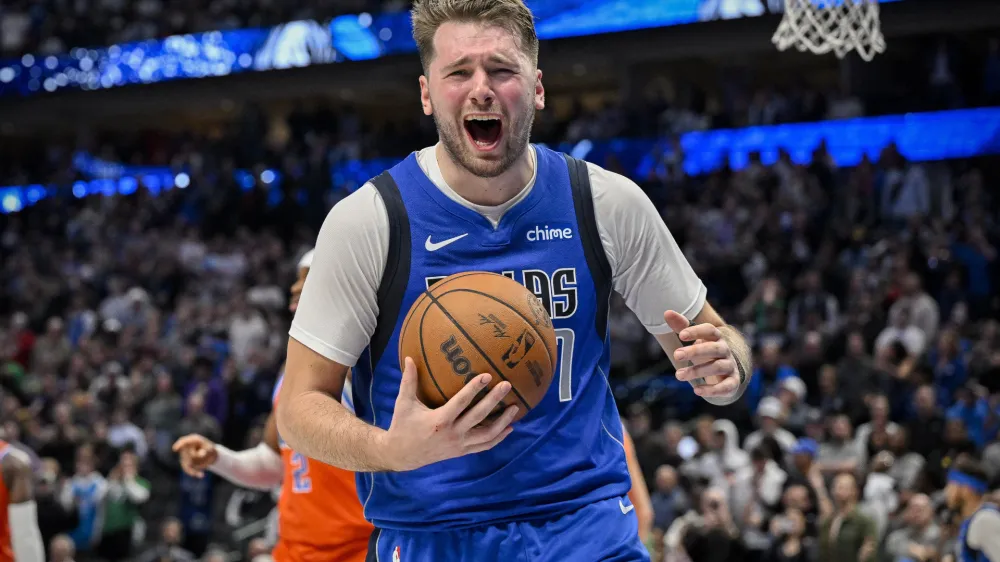 Dec 2, 2023; Dallas, Texas, USA; Dallas Mavericks guard Luka Doncic (77) reacts to being called for a traveling violation during the second half against the Oklahoma City Thunder at the American Airlines Center. Mandatory Credit: Jerome Miron-USA TODAY Sports