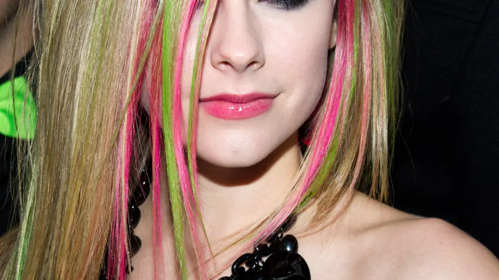 Avril Lavigne arrives to the launch party for her new album, "Goodbye Lullaby", in New York, Tuesday, March 8, 2011. (AP Photo/Charles Sykes)