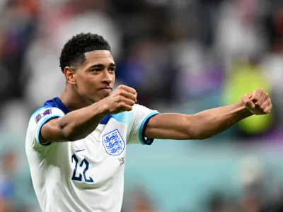 FILED - 04 December 2022, Qatar, Al-Chaur: England's Jude Bellingham celebrates after the FIFA World Cup Qatar 2022 round of 16 soccer match between England and Senegal at Al-Bait Stadium. Bellingham has revealed his ambitions to win all trophies with England national team and Real Madrid. Photo: Robert Michael/dpa