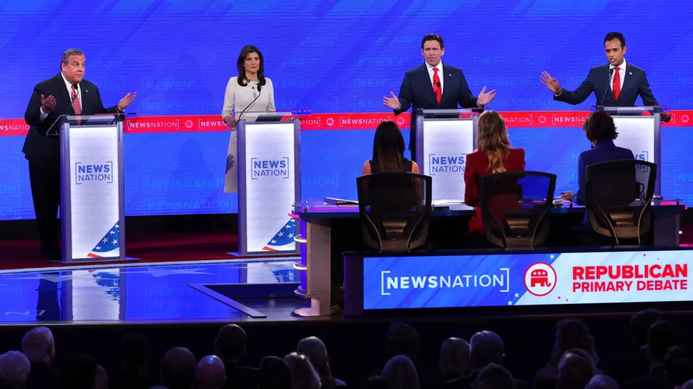 Former New Jersey Governor Chris Christie, former U.S. Ambassador to the United Nations Nikki Haley, Florida Governor Ron DeSantis and tech entrepreneur Vivek Ramaswamy participate during the fourth Republican candidates' debate of the 2024 U.S. presidential campaign hosted by NewsNation at the University of Alabama in Tuscaloosa, Alabama, U.S. December 6, 2023. REUTERS/Brian Snyder