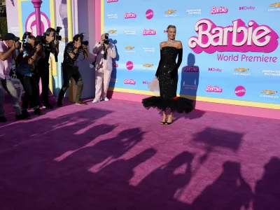 Margot Robbie arrives at the premiere of "Barbie" on Sunday, July 9, 2023, at The Shrine Auditorium in Los Angeles. (AP Photo/Chris Pizzello)