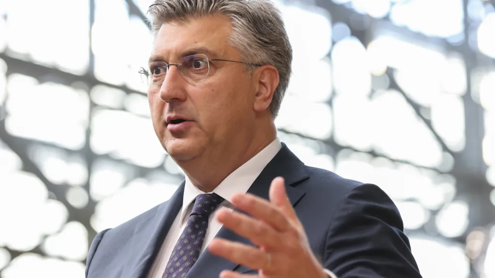 Croatia's Prime Minister Andrej Plenkovic talks to journalists during for the third EU-CELAC summit that brings together leaders of the EU and the Community of Latin American and Caribbean States, in Brussels, Belgium, Tuesday, July 18, 2023. (AP Photo/Francois Walschaerts)