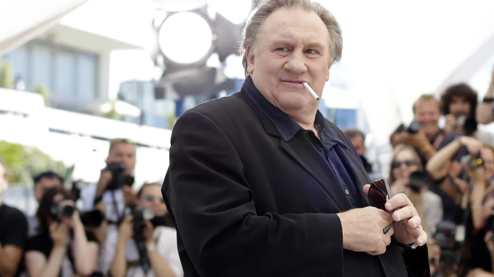 FILE - Actor Gerard Depardieu poses for photographers during a photo call for the film Valley of Love, at the 68th international film festival, Cannes, southern France, Friday, May 22, 2015. An investigation was opened following the death last week of a French actress who was among those accusing movie star Gérard Depardieu of sexual misconduct, the Paris prosecutor's office said Thursday, Dec. 14, 2023. (AP Photo/Thibault Camus, File)