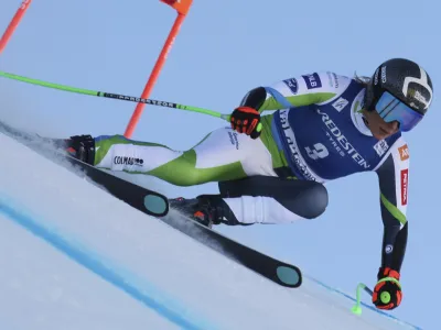 Slovenia's Ilka Stuhec speeds down the course during an alpine ski, women's World Cup Super G race, in Val d'Isere, France, Sunday, Dec. 17, 2023. (AP Photo/Marco Trovati)