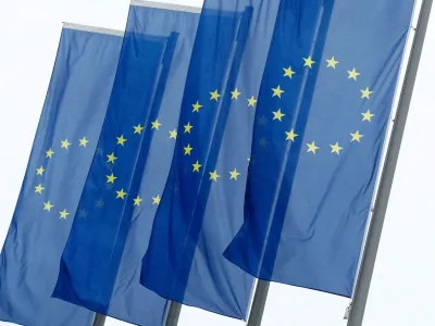 FILE PHOTO: European Union (EU) flags fly in front of the headquarters of the European Central Bank (ECB) in Frankfurt, Germany, July 8, 2020. REUTERS/Ralph Orlowski/File Photo