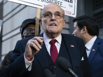 FILE - Former Mayor of New York Rudy Giuliani speaks during a news conference outside the federal courthouse in Washington, Friday, Dec. 15, 2023. Giuliani has filed for bankruptcy, days after being ordered to pay 8 million in a defamation lawsuit. (AP Photo/Jose Luis Magana, File)