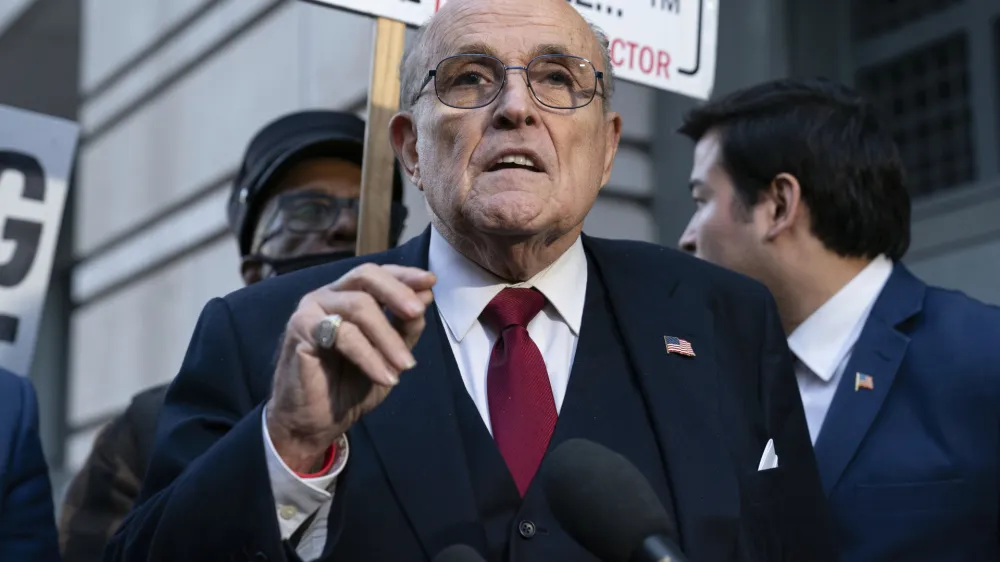 FILE - Former Mayor of New York Rudy Giuliani speaks during a news conference outside the federal courthouse in Washington, Friday, Dec. 15, 2023. Giuliani has filed for bankruptcy, days after being ordered to pay $148 million in a defamation lawsuit. (AP Photo/Jose Luis Magana, File)