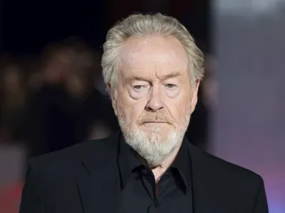 FILE - Ridley Scott poses for photographers upon arrival at the UK premiere of the film 'Napoleon' in London, Thursday, Nov. 15, 2023. Singer Shirley Bassey, director Ridley Scott and England goalkeeper Mary Earps were recognized Friday, Dec. 29, 2023 in the U.K.'s New Year Honors list, which celebrates the achievements and services of more than 1,000 people across the country. Other well-known names on the list include "The Great British Bake Off" judge Paul Hollywood, "Game of Thrones" actor Emilia Clarke, and Justin Welby, the Archbishop of Canterbury. (Photo by Scott Garfitt/Invision/AP, File)