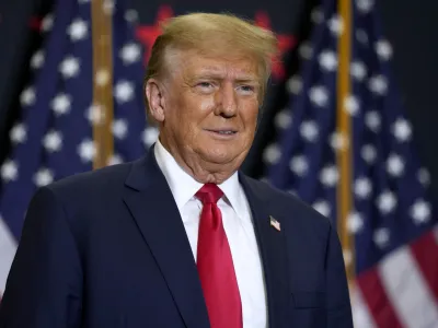 FILE - Former President Donald Trump speaks during a commit to caucus rally, Dec. 19, 2023, in Waterloo, Iowa. Police said Tuesday, Dec. 26, 2023, they are investigating incidents directed at Colorado Supreme Court justices and providing extra patrols around their homes in Denver following the court's decision to remove Trump from the state's presidential primary ballot. (AP Photo/Charlie Neibergall, File)