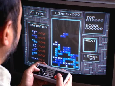 Tetris, an addictive brain-teasing video game, is shown as played on the Nintendo Entertainment System in New York, June 1990. Created by a Soviet scientist, Tetris is the first Communist bloc video game to hit it big in the free market. (AP Photo/Richard Drew)
