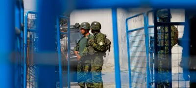 Military personnel guard the entrance to El Inca prison after a security operation due to riots, following the disappearance of Jose Adolfo Macias, alias 'Fito', leader of the Los Choneros criminal group, in Quito, Ecuador January 8, 2024. REUTERS/Karen Toro 