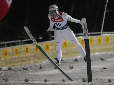 Slovenia's Lovro Kos competes at the Large Hill HS134 Ski Jumping World Cup event in Wisla, Poland, Sunday, Jan. 14, 2024. (AP Photo/Czarek Sokolowski)