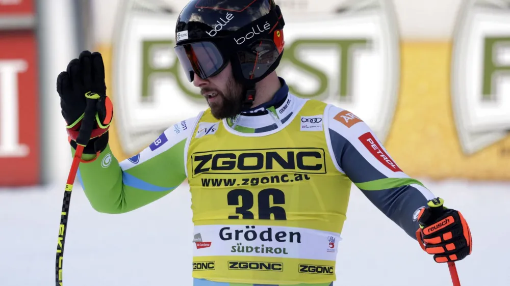 Alpine Skiing - FIS Alpine Ski World Cup - Men's Super G - Val Gardena, Italy - December 15, 2023 Slovenia's Martin Cater reacts after crossing the line during the Men's Super G REUTERS/Leonhard Foeger