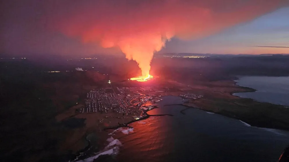 A volcano spews lava and smoke as it erupts in Reykjanes Peninsula, Iceland, January 14, 2024. Iceland Civil Protection/Handout via REUTERS  THIS IMAGE HAS BEEN SUPPLIED BY A THIRD PARTY. MANDATORY CREDIT. NO RESALES. NO ARCHIVES. TPX IMAGES OF THE DAY