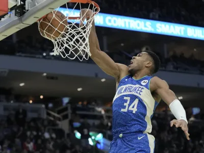 Milwaukee Bucks' Giannis Antetokounmpo dunks during the second half of an NBA basketball game against the New York Knicks Tuesday, Dec. 5, 2023, in Milwaukee. The Bucks won 146-122. (AP Photo/Morry Gash)
