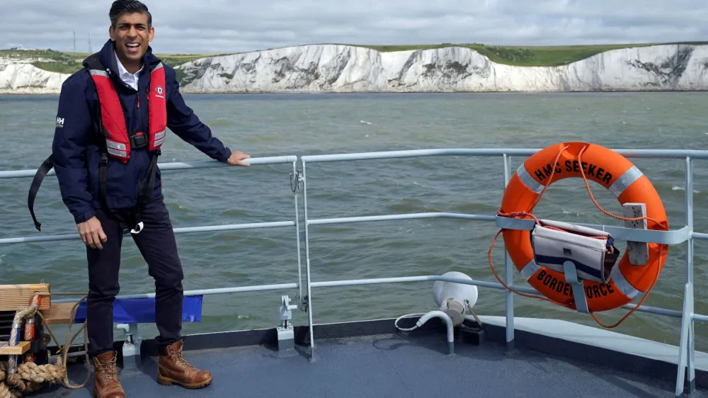 FILE PHOTO: Prime Minister Rishi Sunak onboard Border Agency cutter HMC Seeker during a visit to Dover, ahead of a press conference to update the nation on the progress made in the six months since he introduced the Illegal Migration Bill under his plans to "stop the boats". Picture date: Monday June 5, 2023. Yui Mok/Pool via REUTERS/File Photo