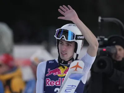 Timi Zajc, of Slovenia, reacts after his final round jump of the ski flying world championships, at the Kulmkogel mountain in Bad Mitterndorf, Austria, Saturday, Jan. 27, 2024. (AP Photo/Matthias Schrader)