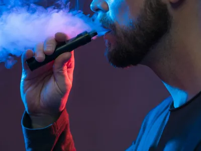 Vaping flavored e-liquid from an electronic cigarette