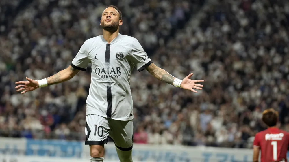 Paris Saint-Germain's Neymar celebrates his goal during a friendly soccer match betweenParis Saint-Germain and Gamba Osaka in Suita, western Japan, Monday, July 25, 2022. (AP Photo/Hiro Komae)