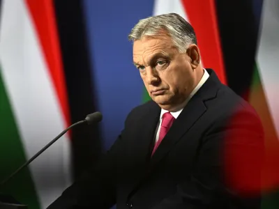 FILE - Hungarian Prime Minister Viktor Orban arrives for an annual international press conference in Budapest, Hungary, Thursday, Dec. 21, 2023. Swedish Prime Minister Ulf Kristersson tells his Hungarian counterpart Viktor Orbán that more dialogue would be beneficial after Orbán invited the Swede to Budapest to discuss Sweden's NATO accession. (AP Photo/Denes Erdos, File)
