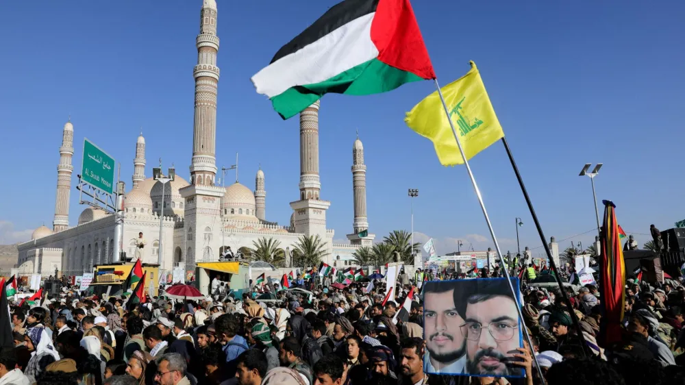 People take part in a weekly rally organised by the Houthis titled 'We Are With Gaza Until Victory,' amid the ongoing conflict between Israel and the Palestinian Islamist group Hamas, in Sanaa, Yemen February 2, 2024. REUTERS/Khaled Abdullah REFILE – REMOVING MENTION OF PLACARDS SHOWING THE HOUTHI SLOGAN