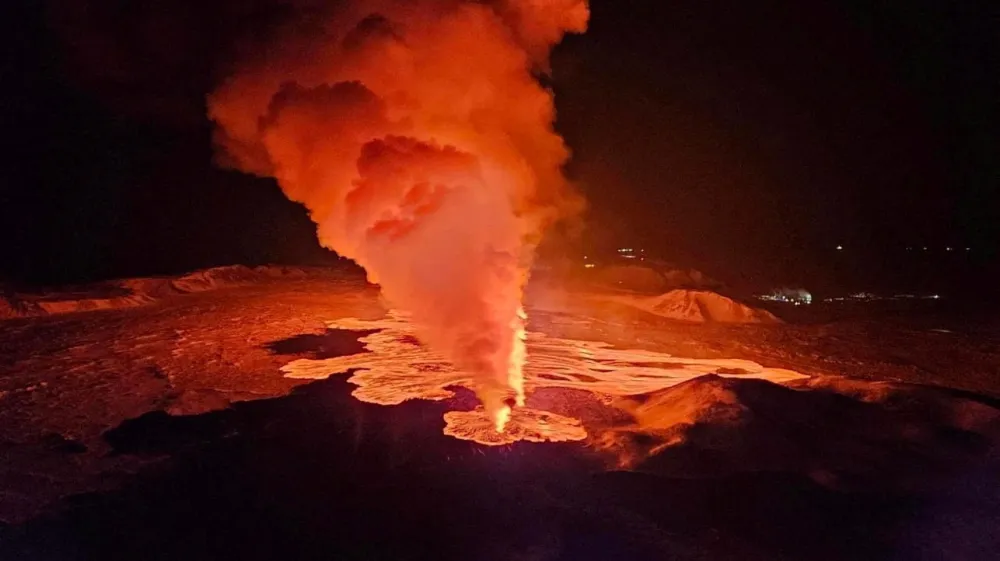 A volcano spews lava and smoke as it erupts, near Grindavik, on Reykjanes Peninsula, Iceland, February 8, 2024. Iceland Civil Protection/Handout via REUTERS THIS IMAGE HAS BEEN SUPPLIED BY A THIRD PARTY. MANDATORY CREDIT. NO RESALES. NO ARCHIVES.