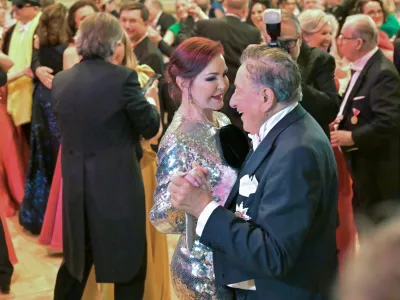 Priscilla Presley and Austrian entrepreneur Richard Lugner dance during the opening ceremony of the traditional Opera Ball in Vienna, Austria, February 8, 2024. REUTERS/Elisabeth Mandl