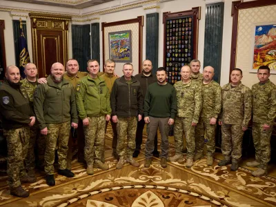 Ukraine's President Volodymyr Zelenskiy poses for a picture with Commander in Chief of the Ukrainian Armed Forces Colonel General Oleksandr Syrskyi, Defence Minister Rustem Umerov and newly appointed top military commanders after a meeting, amid Russia's attack on Ukraine, in Kyiv, Ukraine February 10, 2024. Ukrainian Presidential Press Service/Handout via REUTERS ATTENTION EDITORS - THIS IMAGE HAS BEEN SUPPLIED BY A THIRD PARTY.