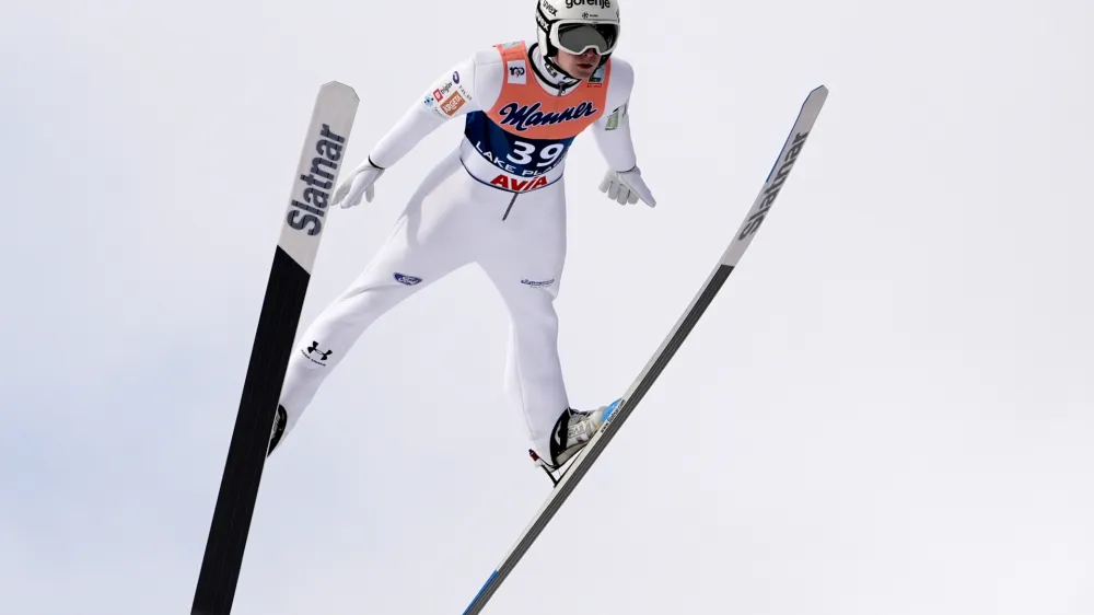 Lovro Kos of, Slovenia, soars during the Men's Large Hill HS128 individual World Cup ski jumping competition, Saturday, Feb. 10, 2024, in Lake Placid, N.Y. (AP Photo/Robert F. Bukaty)