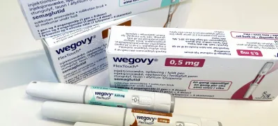 FILE PHOTO: Injection pens and boxes of Novo Nordisk's weight-loss drug Wegovy are shown in this photo illustration in Oslo, Norway, November 21, 2023. REUTERS/Victoria Klesty/Illustration/File Photo