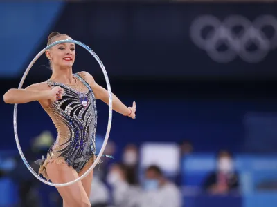 ﻿Japonska, Tokio.<br>OI Tokio 2020 - ritmicna gimnastika, posamicno, mnogoboj, kvalifikacije.<br>Slovenska gimnasticarka Jekaterina Vedenejeva.