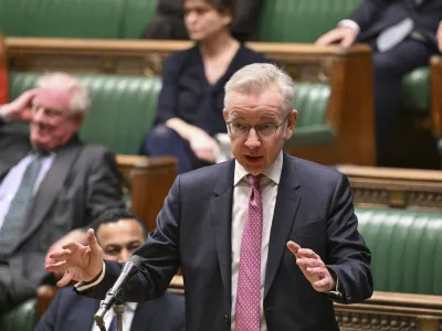In this photo issued by UK Parliament, Communities Secretary Michael Gove makes a statement to MPs in the House of Commons, London, Thursday March 14, 2024, where he set out the the Government's new definition of extremism. The British government has published a new official definition of "extremism." Groups that get the label will be barred from receiving government funding. The move is in response to a surge in reports of antisemitism and anti-Muslim hate speech and what authorities call an increase in radicalization in Britain since Hamas' Oct. 7 attack on Israel, which triggered the war and Israel's invasion of Gaza. (Maria Unger/UK Parliament via AP)