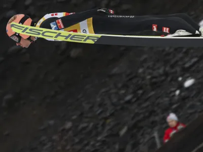 Stefan Kraft from Austria in action during the slope HS 240 men's qualification for the FIS World Cup ski flying race in Vikersund, Norway, Friday March 15, 2024. (Geir Olsen/NTB via AP)