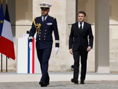 France's President Emmanuel Macron walks during a "national tribute" ceremony for late French politician and admiral, Philippe de Gaulle, son of Charles de Gaulle, at the Hotel des Invalides in Paris, France on March 20, 2024. LUDOVIC MARIN/Pool via REUTERS