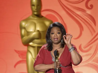 Jean Hersholt Humanitarian Award recipient Oprah Winfrey speaks after accepting her Oscar statuette at the Academy of Motion Picture Arts & Sciences 2011 Governors Awards in Hollywood, California November 12, 2011. REUTERS/Todd Wawrychuk/A.M.P.A.S./Handout (UNITED STATES - Tags: ENTERTAINMENT) NO SALES. NO ARCHIVES. FOR EDITORIAL USE ONLY. NOT FOR SALE FOR MARKETING OR ADVERTISING CAMPAIGNS