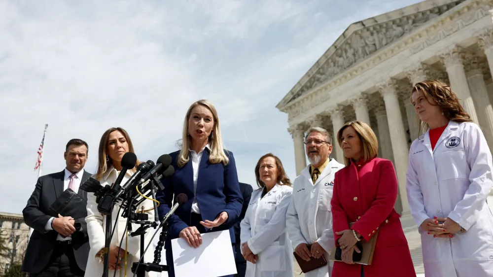 Lawyer Erin Hawley of the Alliance Defending Freedom and wife of U.S. Senator Josh Hawley (R-MO), speaks with the media outside the U.S. Supreme Court as justices hear oral arguments in a bid by President Joe Biden's administration to preserve broad access to the abortion pill, outside the court in Washington, U.S., March 26, 2024. REUTERS/Evelyn Hockstein