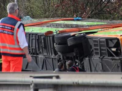 Emergency staff talk at the scene after several people were killed and more injured in a coach crash on the A9 motorway off Schkeuditz, near the eastern German city of Leipzig, Germany, March 27, 2024.  REUTERS/Marvin Matzulla/Mitteldeutsche Zeitung