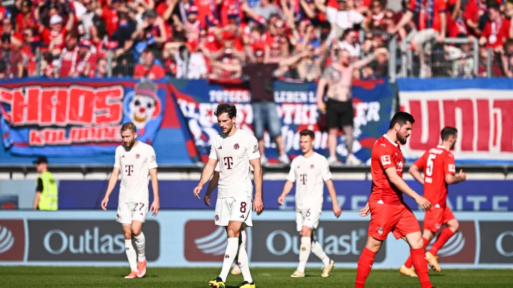 06 April 2024, Baden-Württemberg, Heidenheim: (L-R) Munich's Konrad Laimer, Leon Goretzka and Joshua Kimmich react after Heidenheim scored their third goal during the German Bundesliga soccer match between 1. FC Heidenheim and Bayern Munich at Voith-Arena. Photo: Tom Weller/dpa - IMPORTANT NOTICE: DFL and DFB regulations prohibit any use of photographs as image sequences and/or quasi-video.