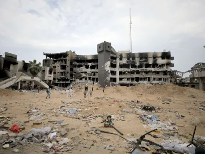 Rescuers and medics search for dead bodies inside the damaged Al Shifa Hospital after Israeli forces withdrew from the hospital and the area around it following a two-week operation, amid the ongoing conflict between Israel and Hamas, in Gaza City April 8, 2024. REUTERS/Dawoud Abu Alkas