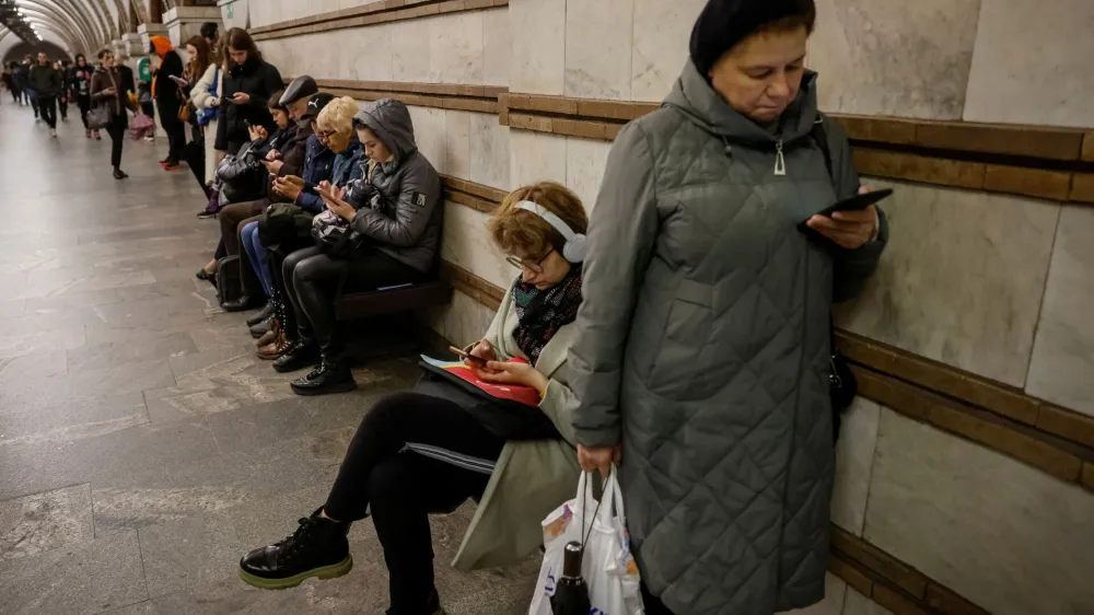 People take shelter inside a metro station during a Russian missile strike, amid Russia's attacks on Ukraine, in Kyiv, Ukraine, April 17, 2024. REUTERS/Alina Smutko