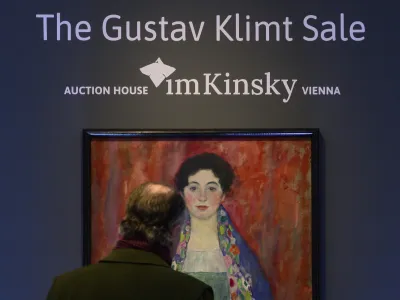 A man looks at the painting 'Portrait of Fräulein Lieser' by Austrian painter Gustav Klimt prior to an auction, in Vienna, Wednesday, April 24, 2024. A portrait of a young woman by Gustav Klimt that was long believed to be lost has been sold at an auction in Vienna for 30 million euros ( million). The Austrian modernist artist started work on the "Portrait of Fräulein Lieser" in 1917, the year before he died, and it is one of his last works. (AP Photo/Christian Bruna)