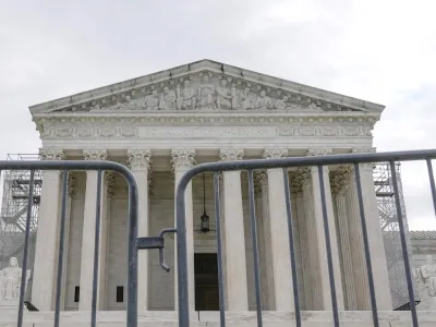 The Supreme Court is seen during a protest outside the as the justices prepare to hear arguments over whether Donald Trump is immune from prosecution in a case charging him with plotting to overturn the results of the 2020 presidential election, on Capitol Hill Thursday, April 25, 2024, in Washington. (AP Photo/Mariam Zuhaib)
