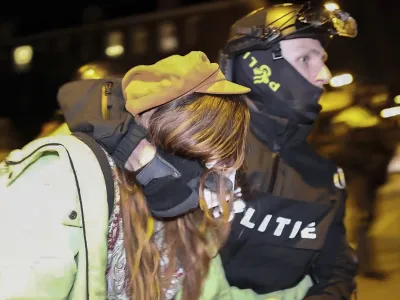 In this image taken from video Police arrests some 125 activists as they broke up a pro-Palestinian demonstration camp at the University of Amsterdam in Amsterdam, the Netherlands, Tuesday, May 7, 2024, as protests that have roiled campuses in the United States spread into Europe. (AP Photo InterVision)