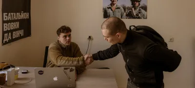 KYIV, UKRAINE - APRIL 10: Maksym, a former actor in charge of the recruiting center, talks to Dmytro Jasynok from Sumy who decided to voluntarily join the unit after a bomb fell 100 meters from his home, at Recruiting Center of Da Vinci Wolves Battalion from Ukrainian Army in Kyiv, Ukraine on April 10, 2024. After the president Zelenskyy signed new mobilization law in Ukraine, military conscription age is lowered from 27 to 25 in an effort to replenish its depleted ranks after more than two years of war. Andre Luis Alves / AnadoluNo Use USA No use UK No use Canada No use France No use Japan No use Italy No use Australia No use Spain No use Belgium No use Korea No use South Africa No use Hong Kong No use New Zealand No use Turkey